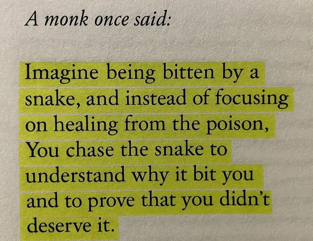 Quote about a monk and a snake, highlighted text on paper.