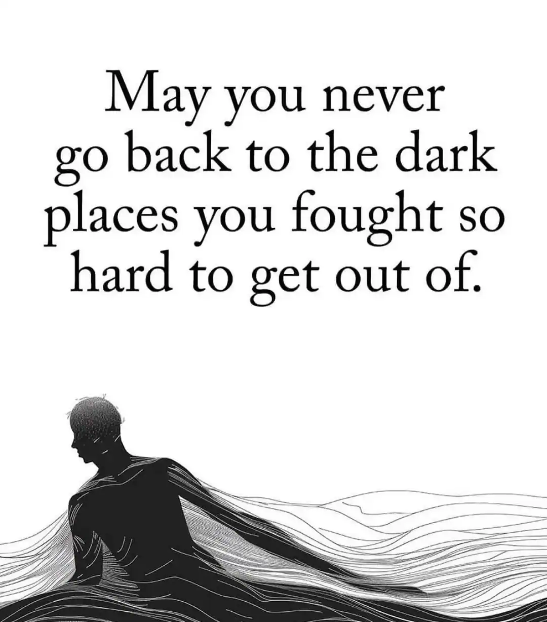 Motivational quote about overcoming dark places with a silhouette of a person.