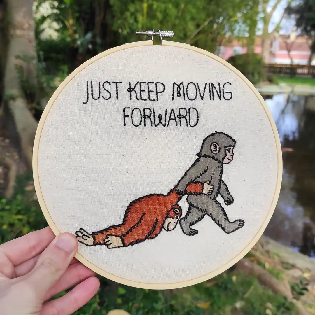 Just keep moving forward with a drawing of a monkey pulling a person on a leash.