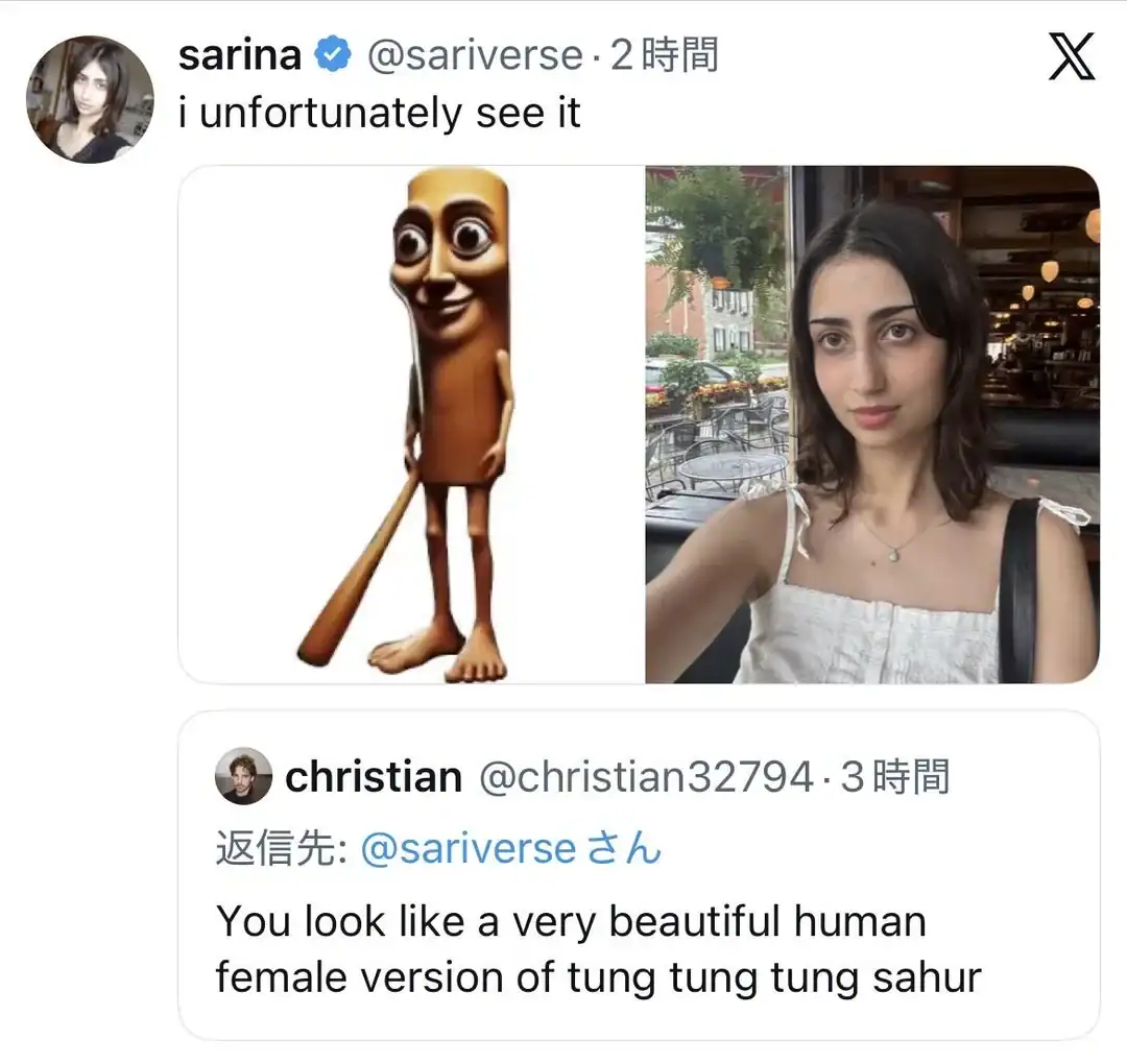A cartoon sausage with a face and limbs next to a woman with dark hair in a white top.
