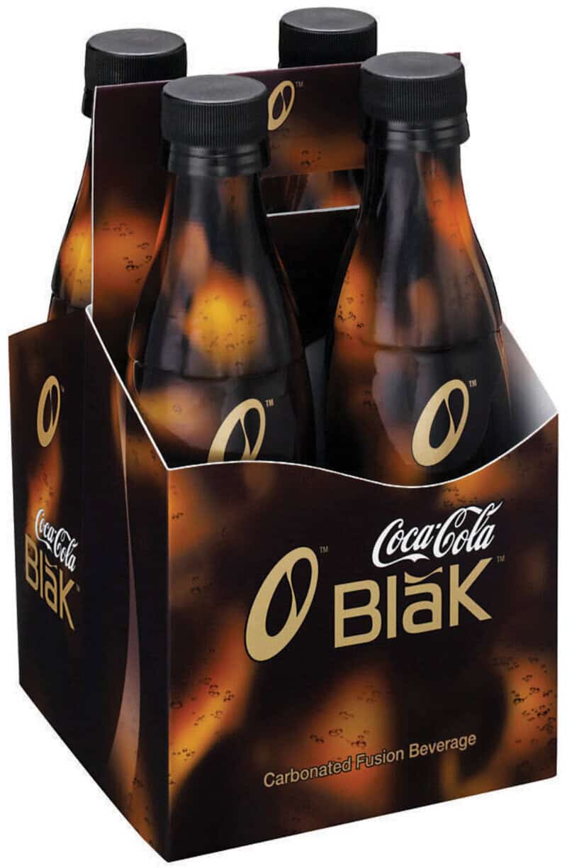 Four Coca-Cola Blak bottles in a cardboard carrier, carbonated fusion beverage.