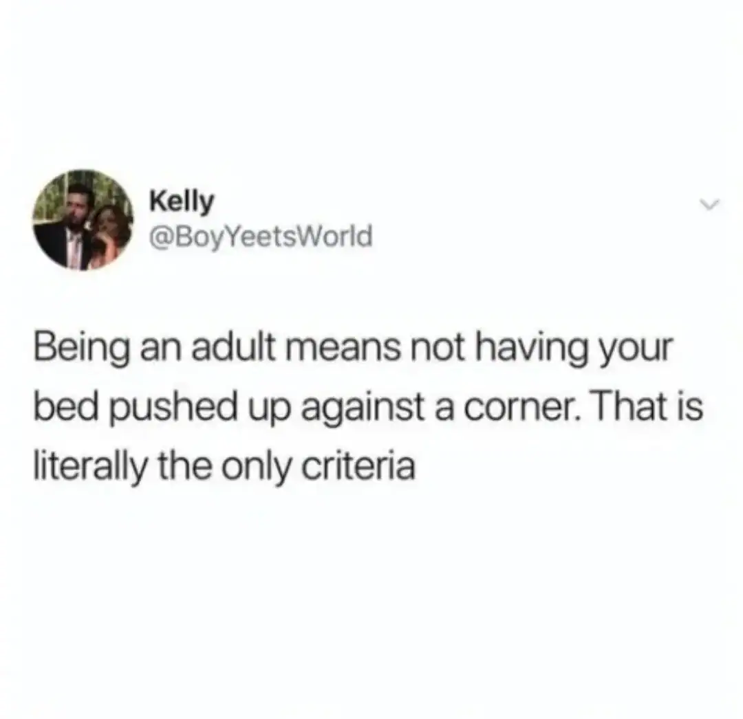Tweet by Kelly about adult bed criteria: not having your bed pushed against a corner.