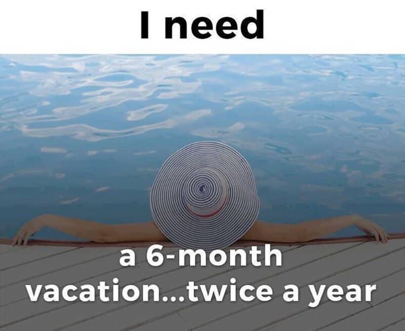 Person with a large sun hat relaxing by the water, caption about needing a 6-month vacation twice a.