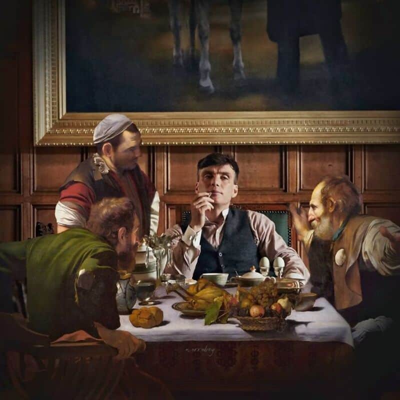 A young man sits at a table with three older men, in a room with a large painting of horses behind.