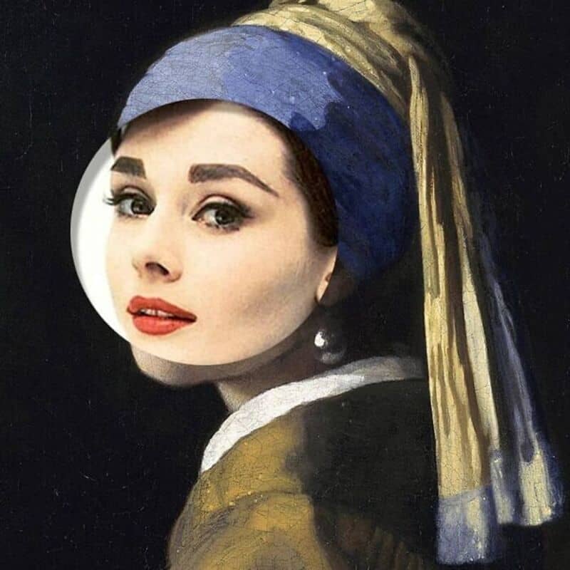 Portrait of a woman with a blue and gold headscarf, red lipstick, and pearl earring.