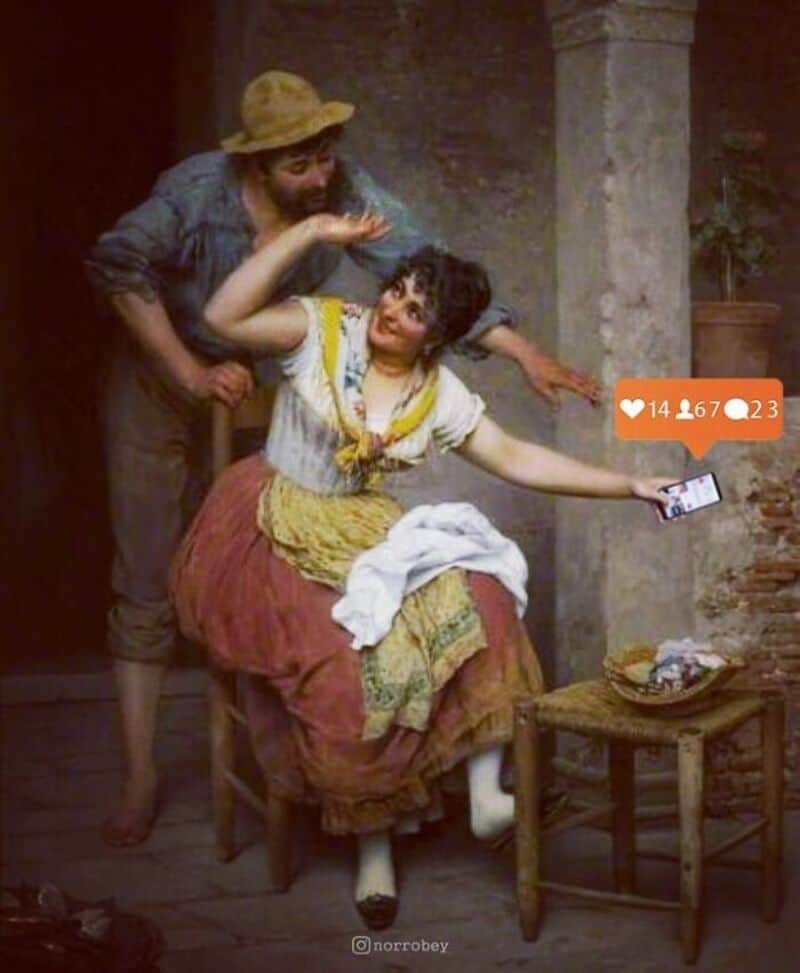 A woman sitting on a chair with a man leaning over her, both making playful gestures.