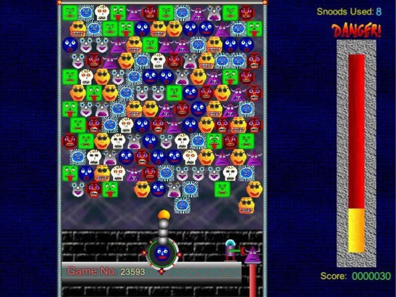 Screenshot of a puzzle game with colorful emoji faces and a warning 'DANGER!'.