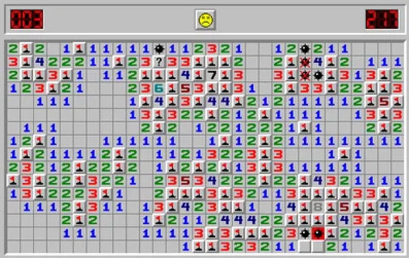 Minesweeper game screen with numbers, mines, and a timer.