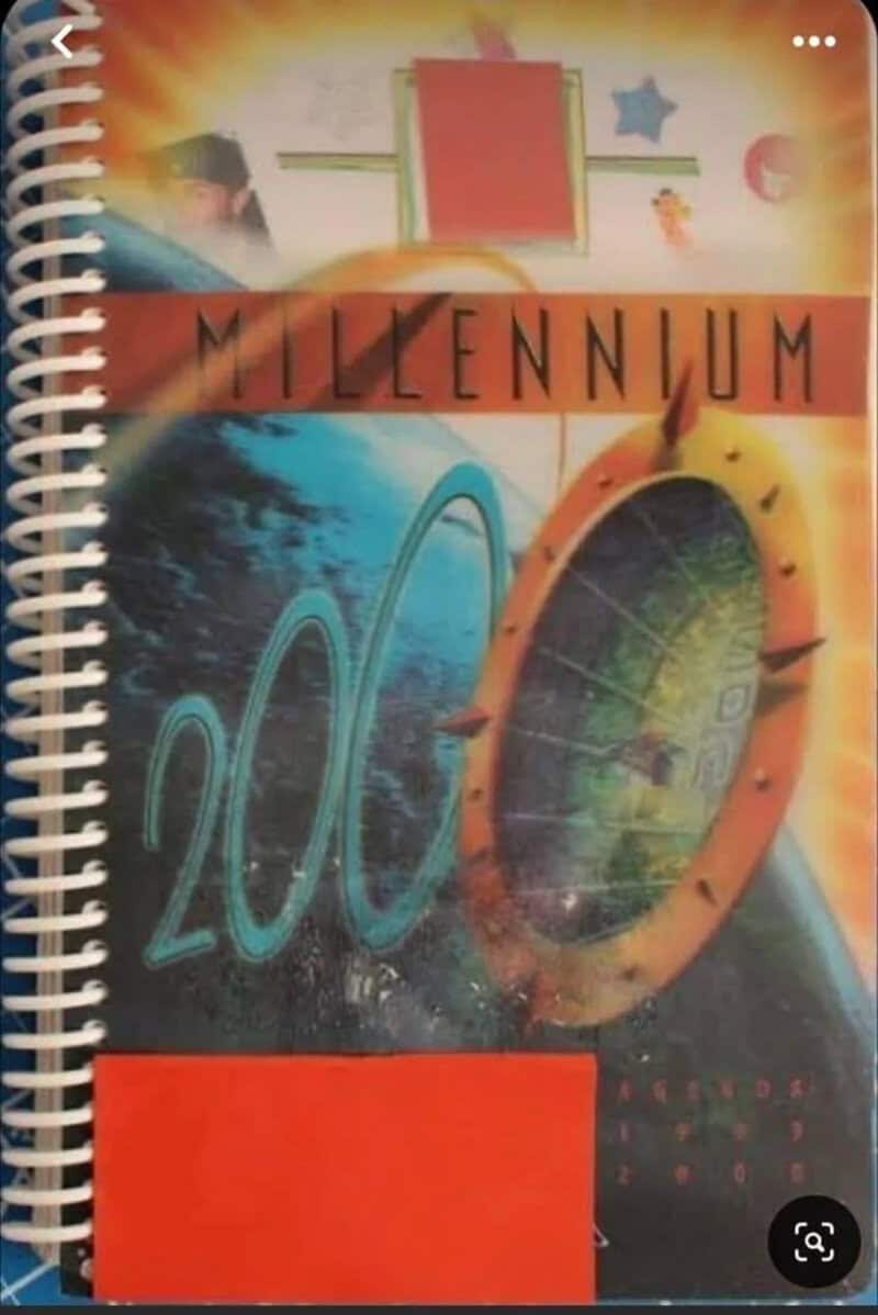 Millennium 2000 agenda book with colorful cover and spiral binding.
