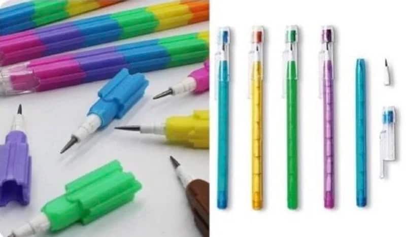 Colorful gel pens and markers on a white background.