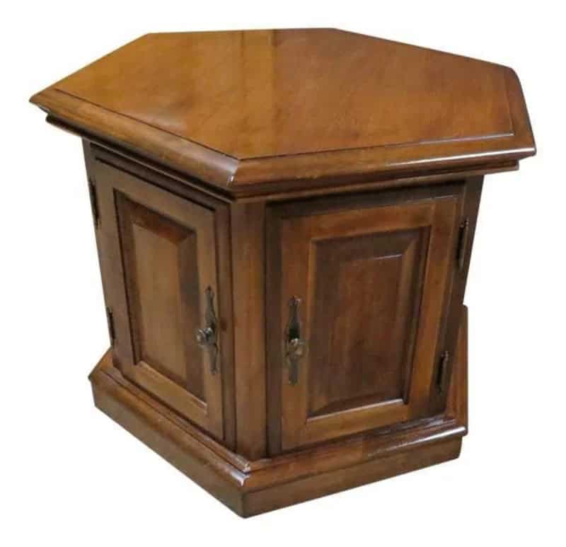 Wooden corner cabinet with two doors and metal handles.