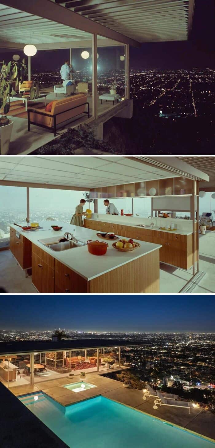 Modern home with large glass windows overlooking city at night.