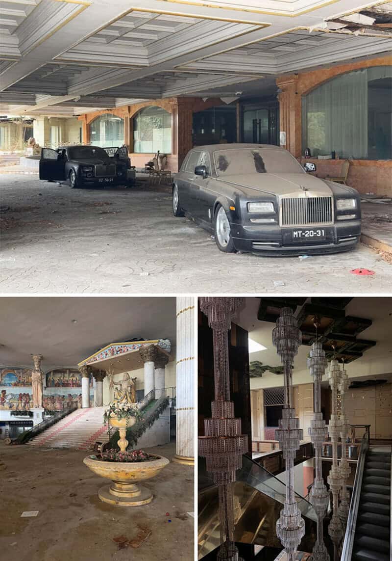 Vintage cars inside an abandoned building with ornate decor and damaged floors.