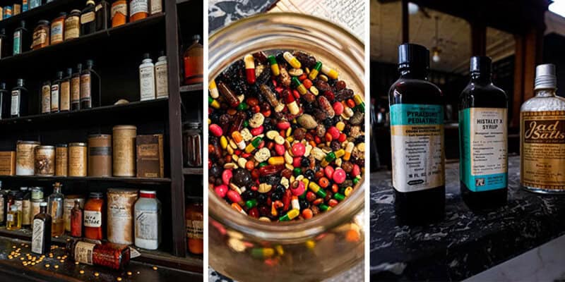 Assorted bottles and jars on shelves, colorful candies in a jar, and laboratory bottles on a black-t.