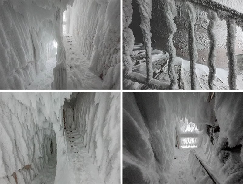 Ice-covered corridor and staircase with frosty railings and walls.