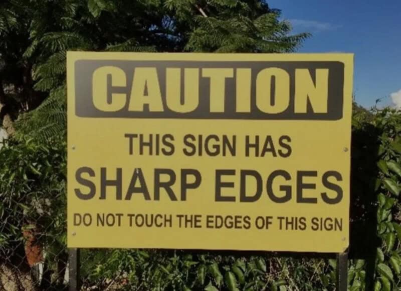 Caution sign warns of sharp edges, do not touch the edges.