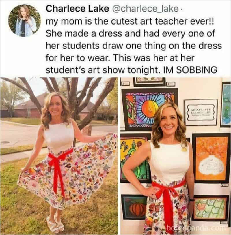 Mom in a dress made from her students' artwork at art show.