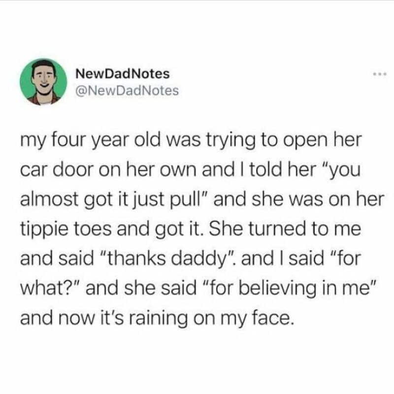 Four-year-old girl trying to open her car door, thanks her dad, rain on face.