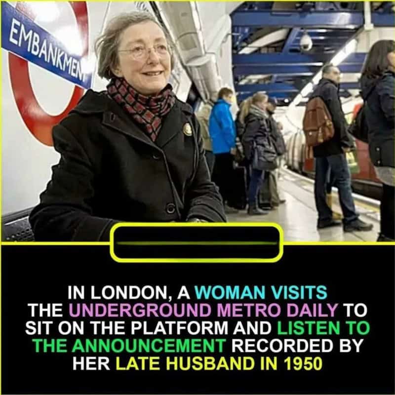 Woman sitting on London Underground platform with people in background.
