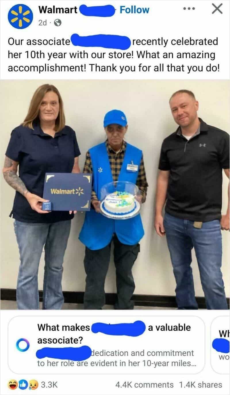 Walmart associate celebrating 10 years with a cake and two colleagues.