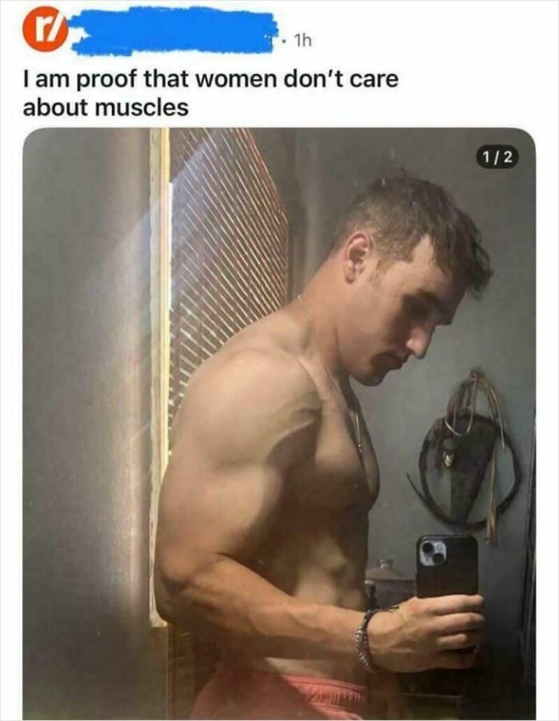 Proof that women don't care about muscles, shirtless man taking mirror selfie.