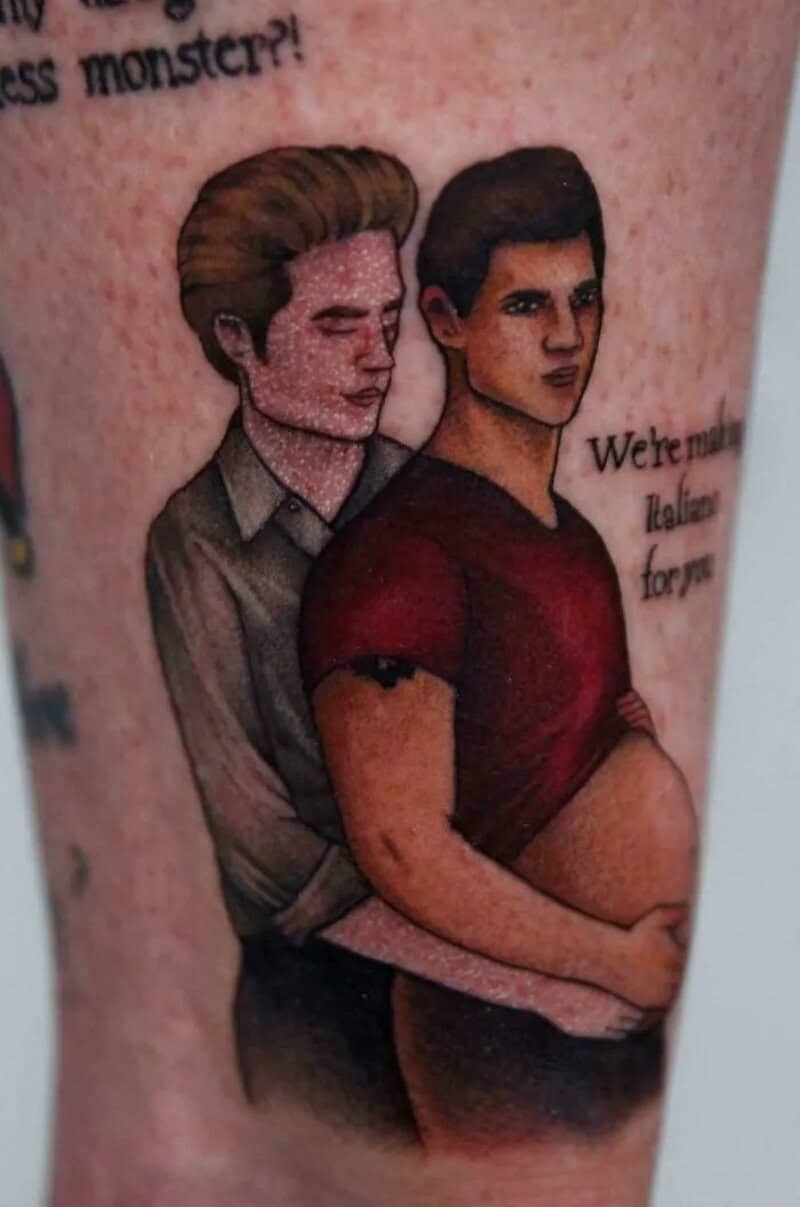 Tattoo of a man and pregnant woman with text, on skin.