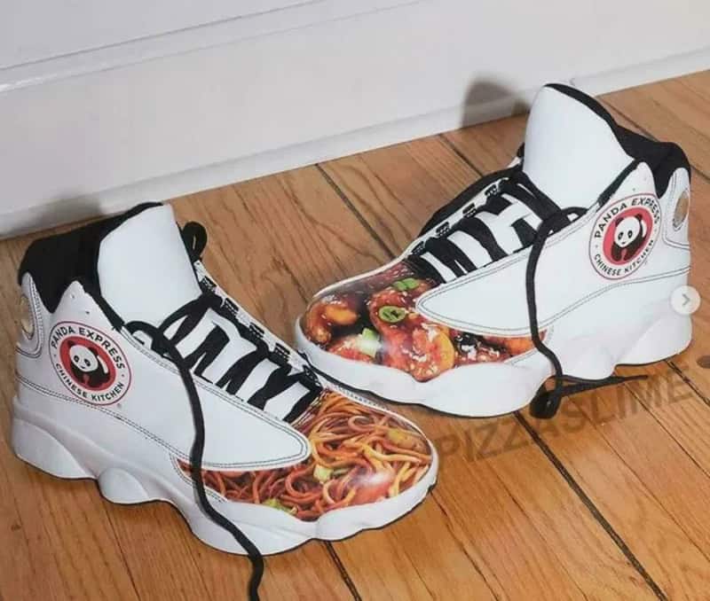 Custom panda express sneakers with pizza and spaghetti designs on the toes.