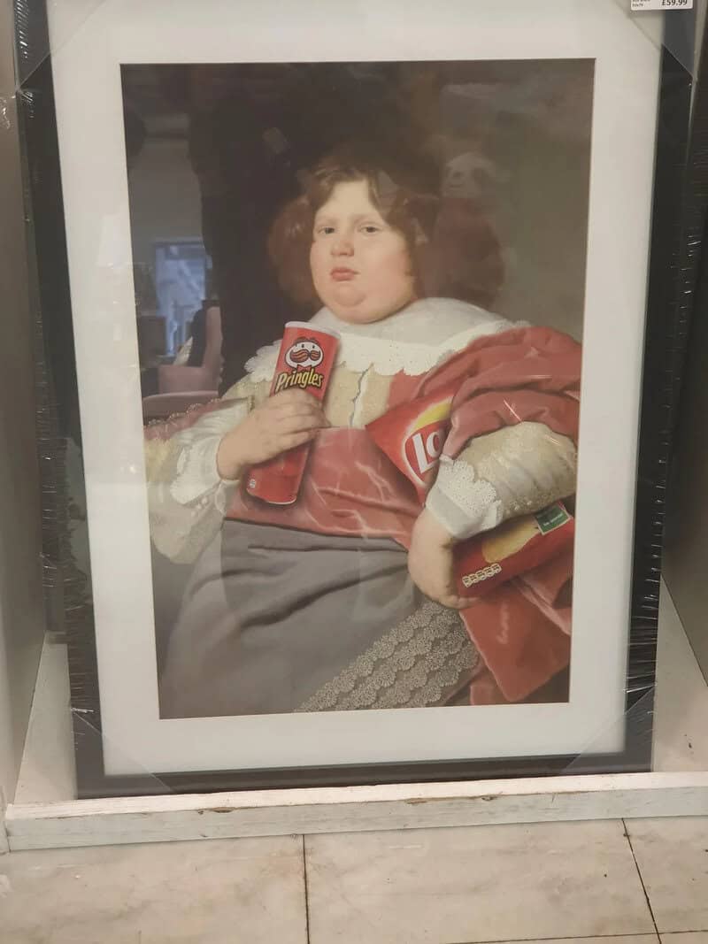 Child with a cookie and chips bag, sitting with a bandaged arm, in a framed photo.