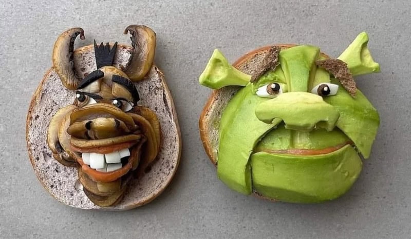 Creative bread art resembling a cartoon character and a mythical creature.