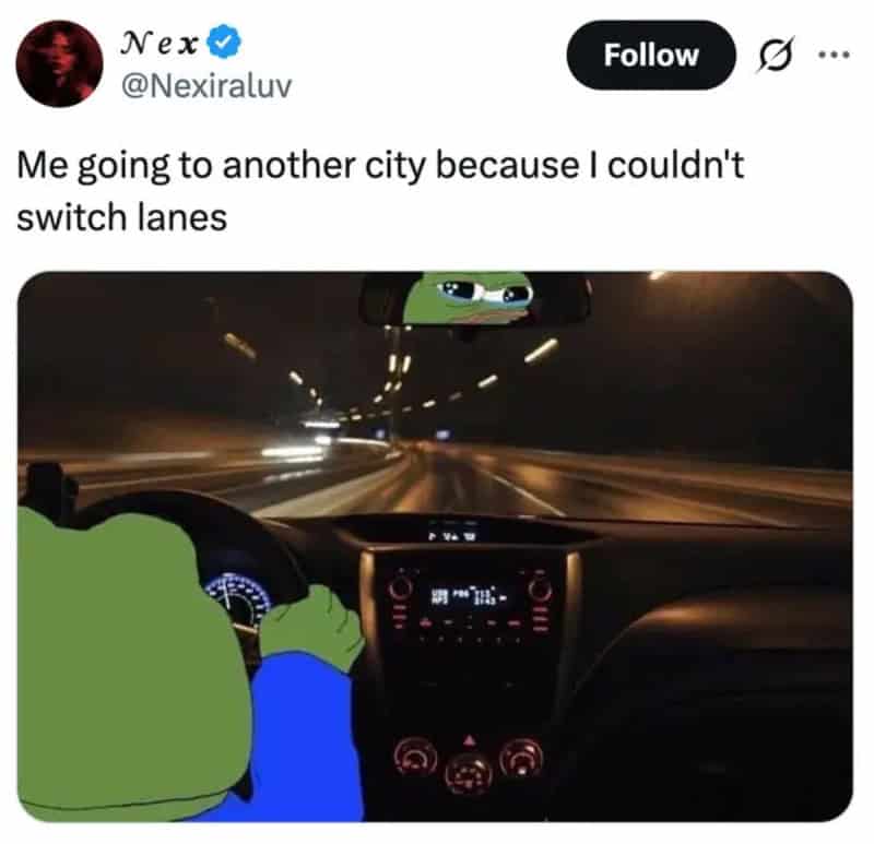 Cartoon frog driving a car at night with a Pepe meme face in the sky.