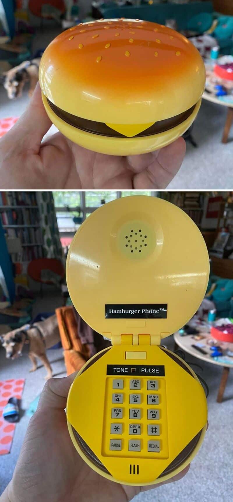 Yellow hamburger-shaped phone with speaker and keypad, held in hand.