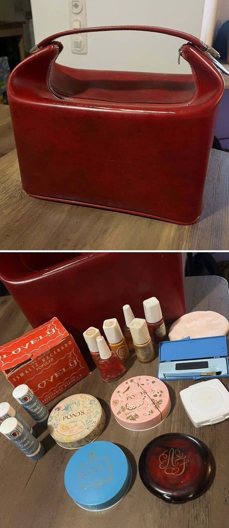 Red vintage handbag and collection of cosmetics and skincare products.
