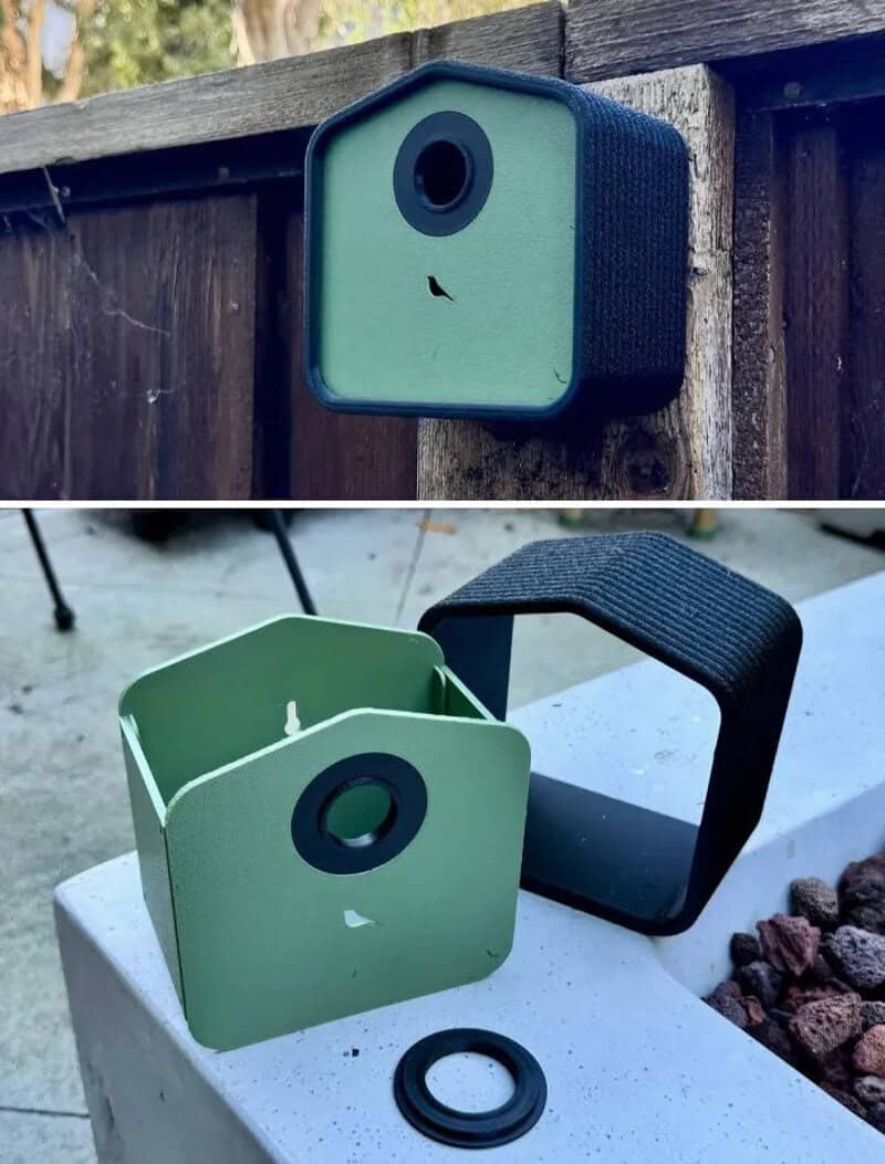Two birdhouses, one blue and one green, with a black ring and a black cover.