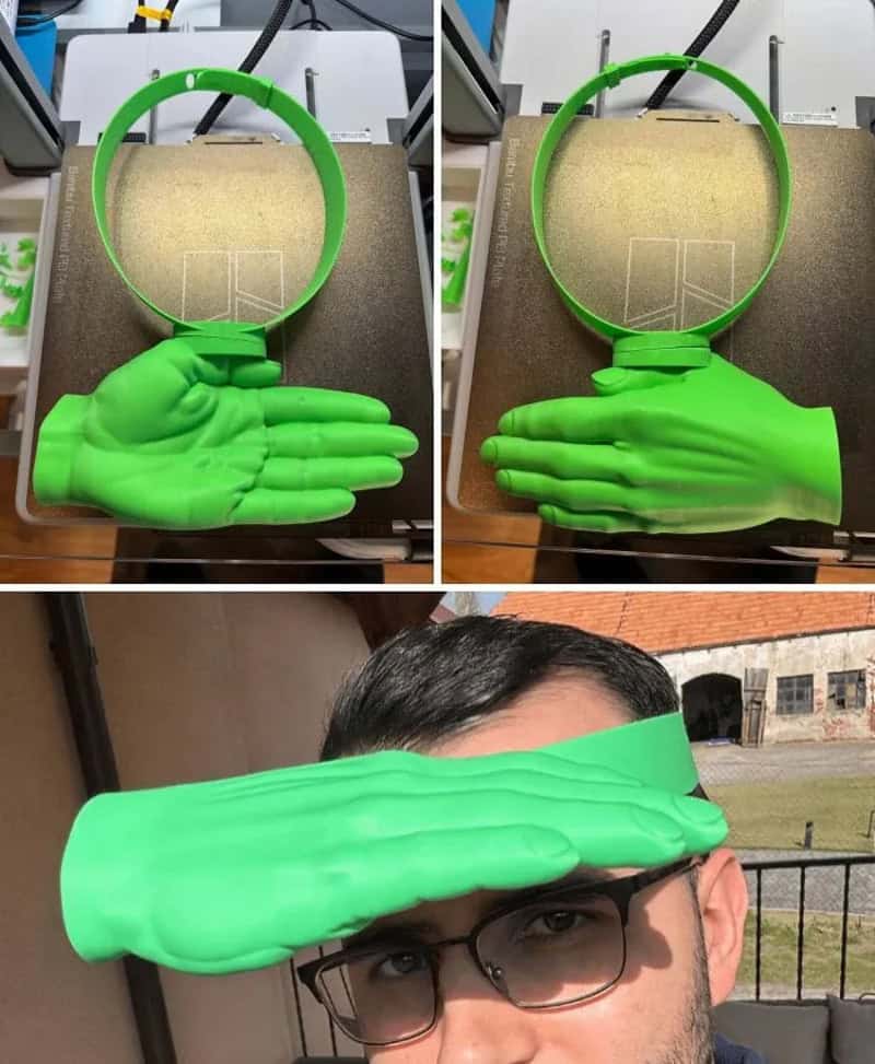 Green 3D-printed hand and headband with a soccer field design.