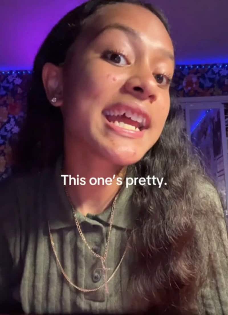 Young woman with long dark hair smiling, caption says "This one's pretty.".