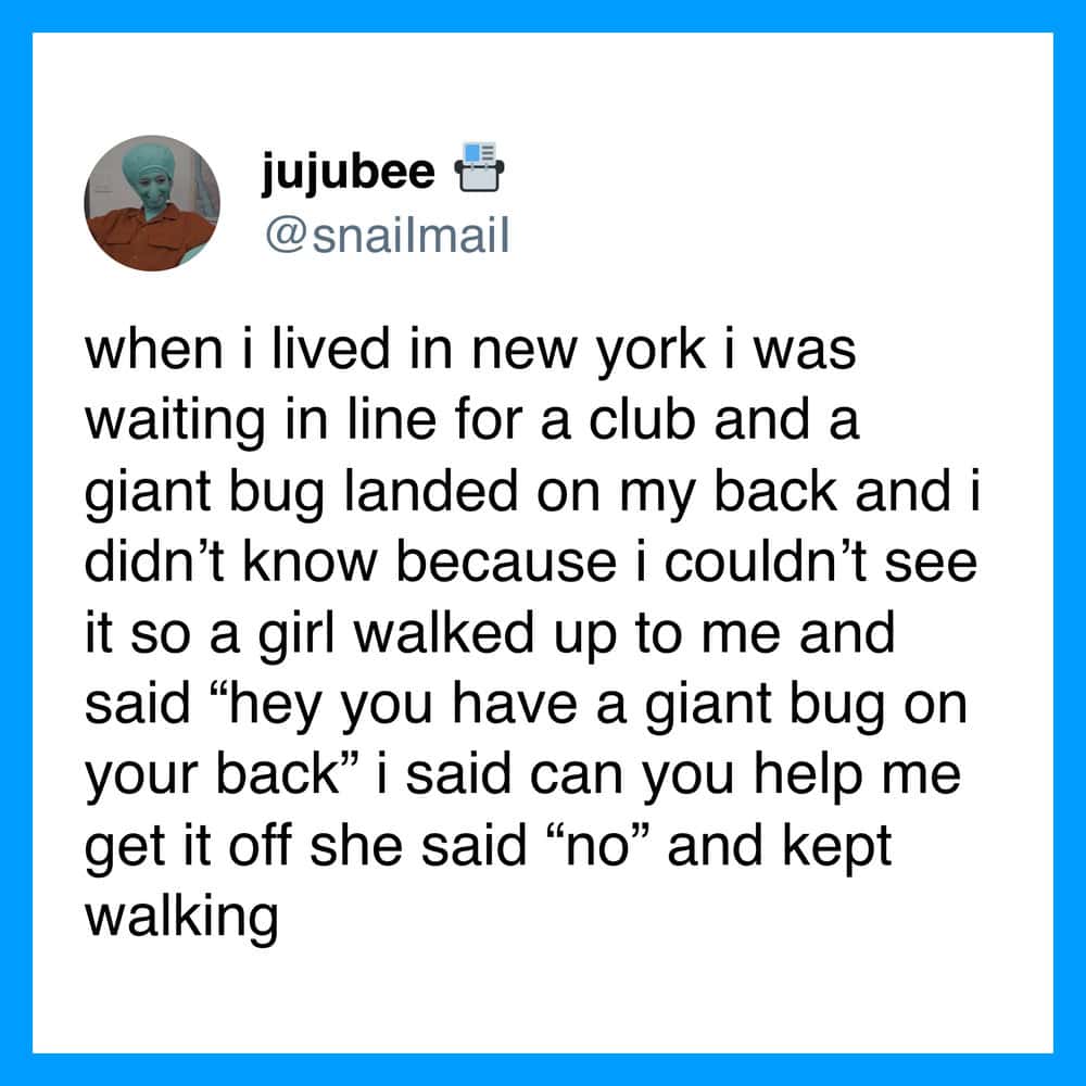 A tweet about a girl helping a person with a giant bug on their back in New York.