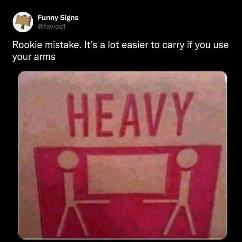 It's easier to carry using your arms, with a heavy table between two stick figures.