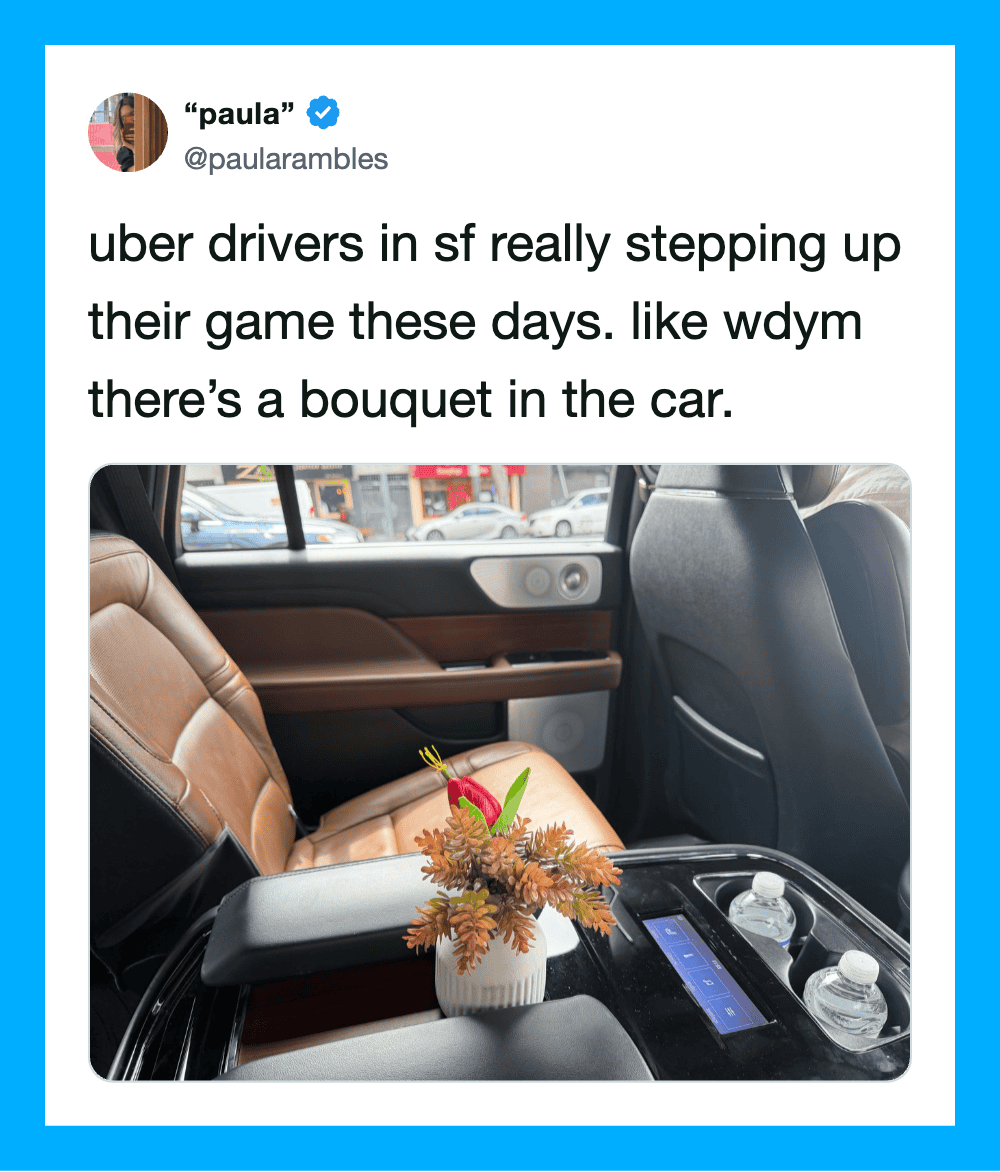Uber driver in SF with a bouquet in the car, as described in the tweet.