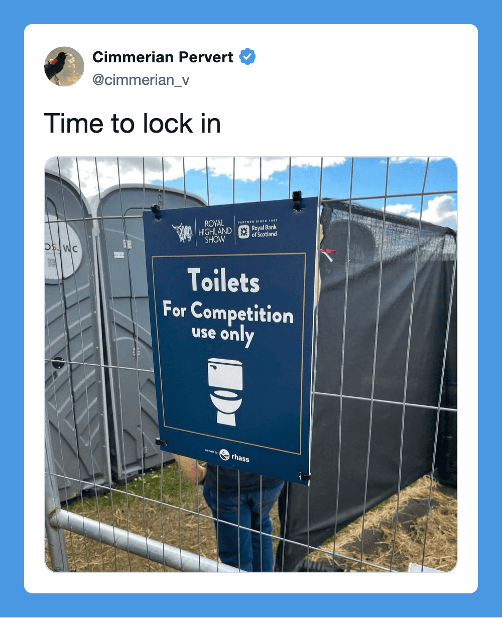 Sign for toilets for competition use only at Royal Highland Show, behind a metal fence.