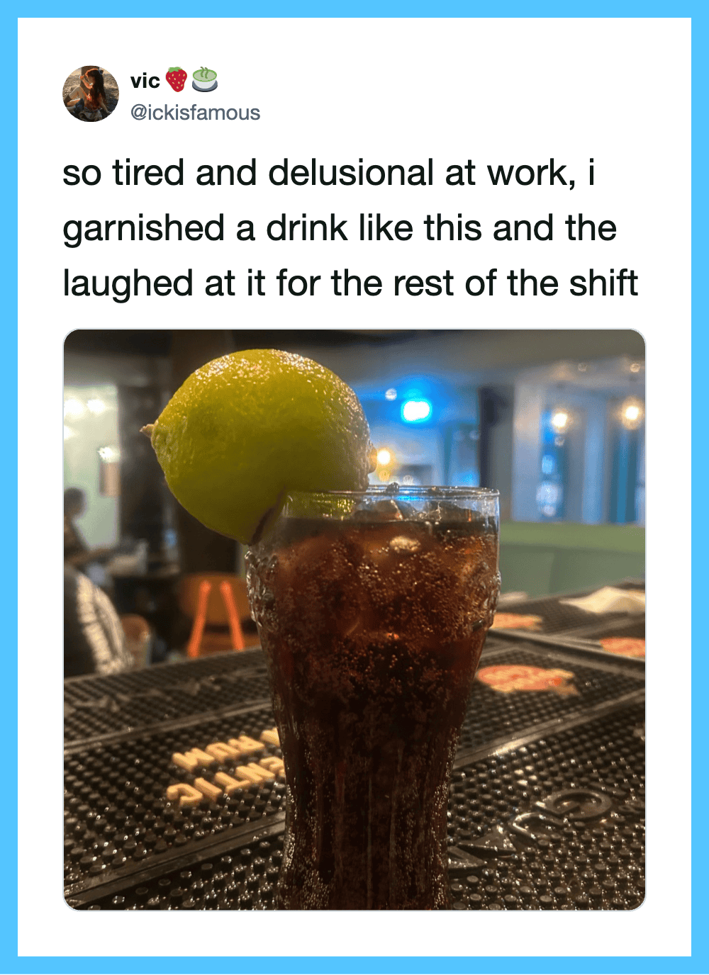 A drink garnished with a large lime wedge, with a humorous caption about work fatigue.