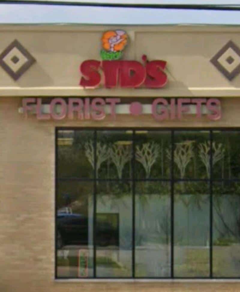Sign for SIDS Florist and Gifts with a flower logo on top.