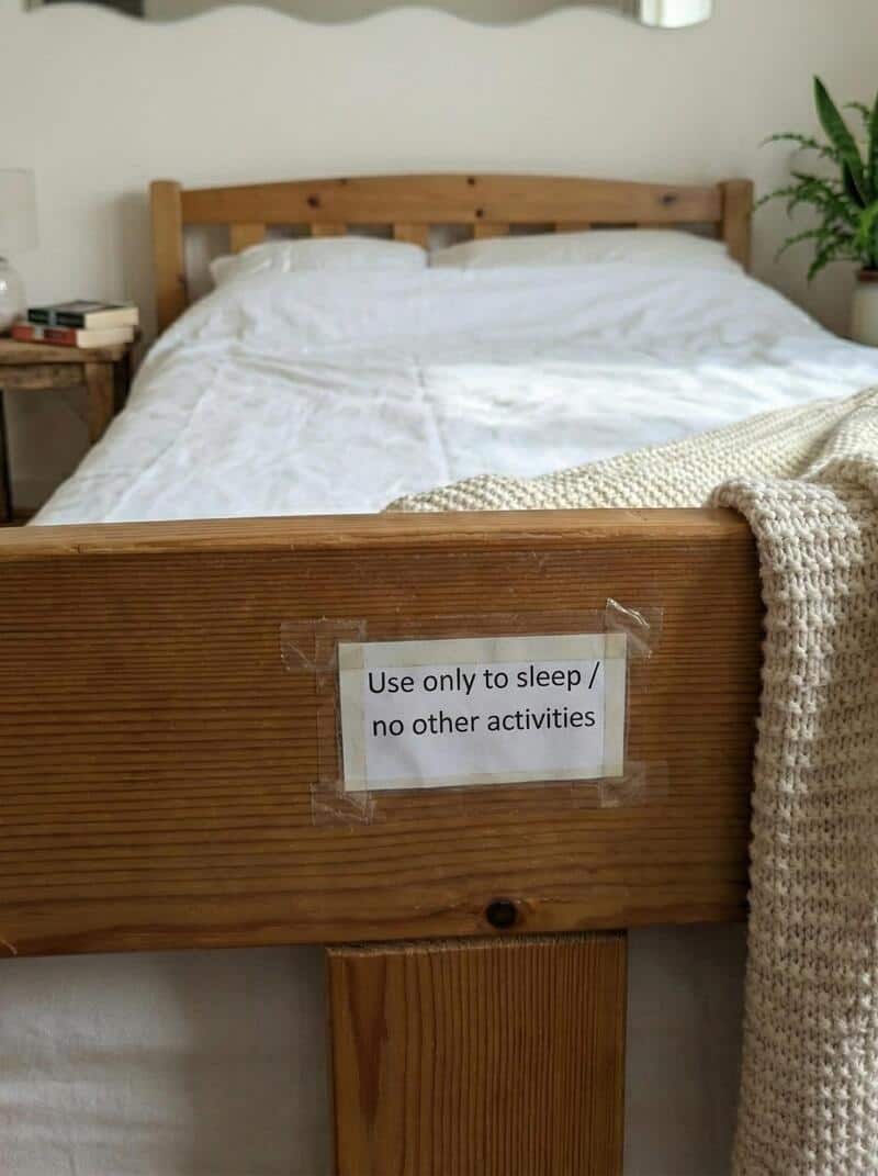 Sign on bed says 'Use only to sleep / no other activities'.