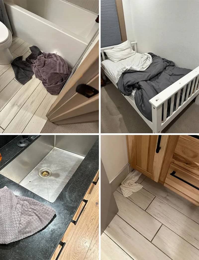 Clothes and towels on bathroom floor, bed with unmade sheets, kitchen sink with towel, and a sock on.