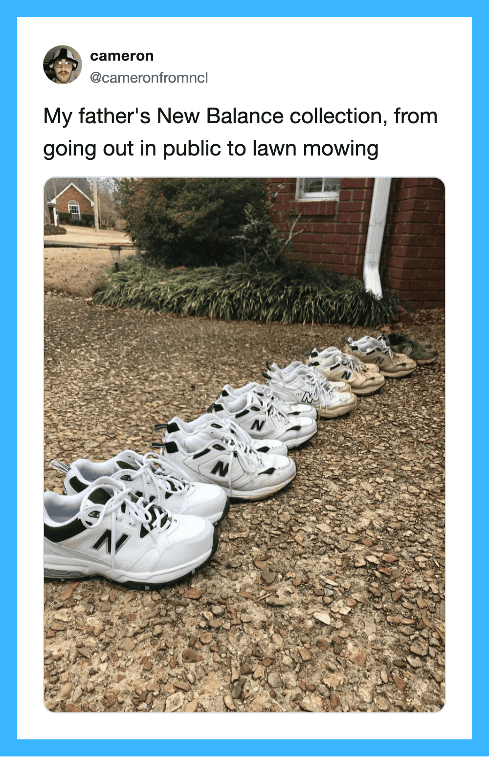 Line of white New Balance shoes outside a house with a garden.