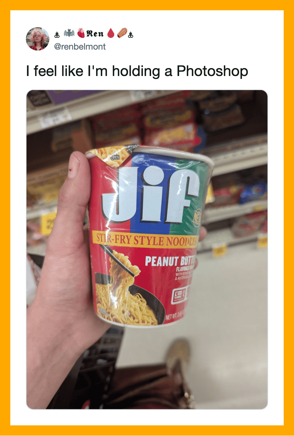 Hand holding a Jif peanut butter flavored noodle cup in a grocery store.