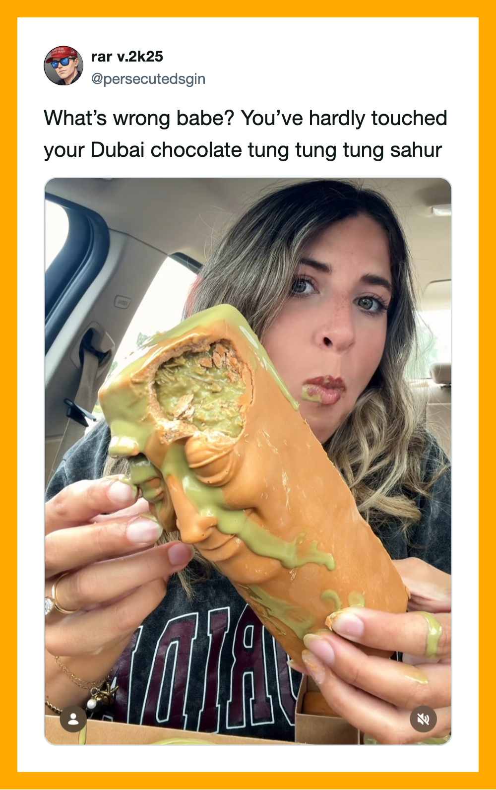 Woman holding a large Dubai chocolate tung tung tung sahur with green filling.