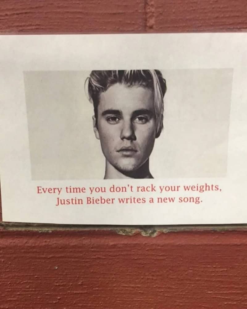 Justin Bieber meme with a serious face and a quote about weights and songs.
