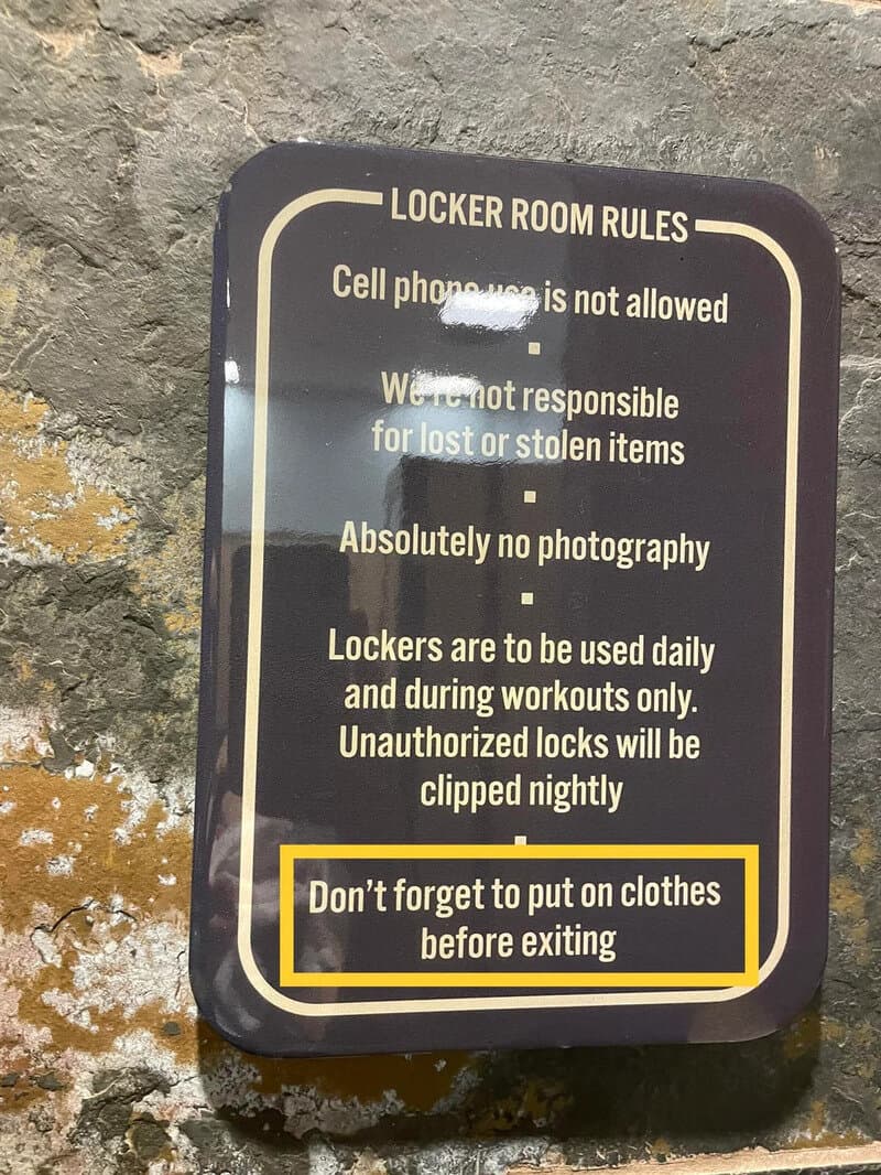 Locker room rules sign with rules about cell phones, photography, and clothes.