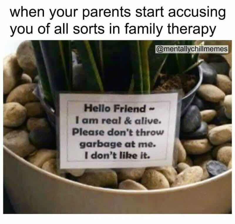 Sign in plant pot says: Hello Friend - I am real & alive. Please don't throw garbage at me. I don't像.