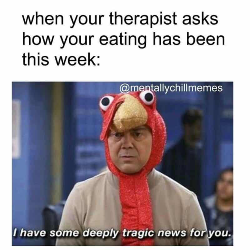 Person in a crab costume with serious expression, meme about therapy and eating habits.
